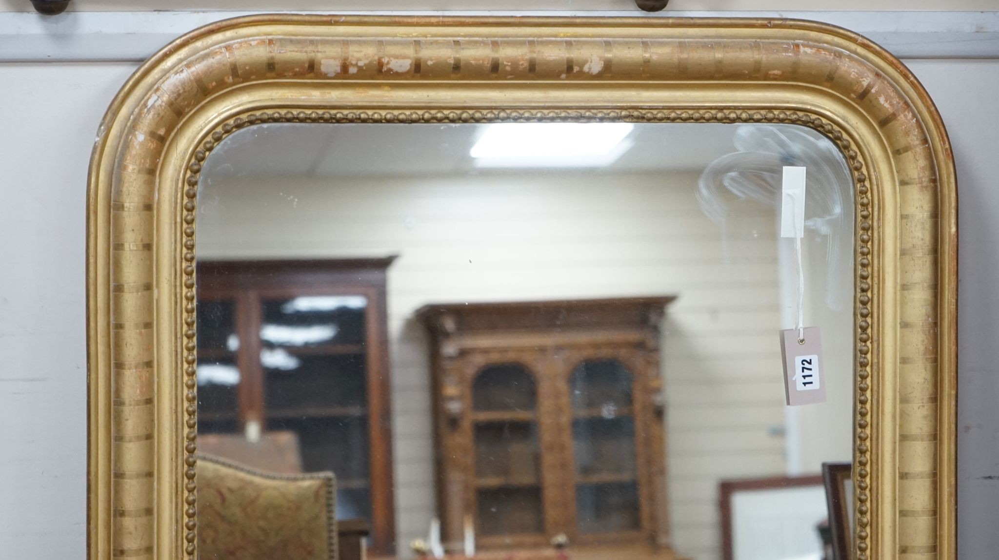 A 19th century French giltwood overmantel mirror, width 79cm, height 134cm